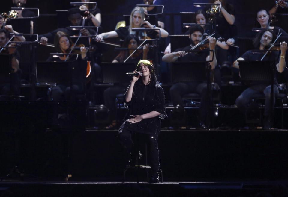 Billie Eilish performs on stage at the Brit Awards 2020 in London, Tuesday, Feb. 18, 2020. (Photo by Joel C Ryan/Invision/AP)