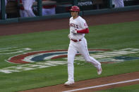 Los Angeles Angels starting pitcher Shohei Ohtani (17) runs the bases after hitting a home run during the first inning of a baseball game against the Chicago White Sox Sunday, April 4, 2021, in Anaheim, Calif. (AP Photo/Ashley Landis)