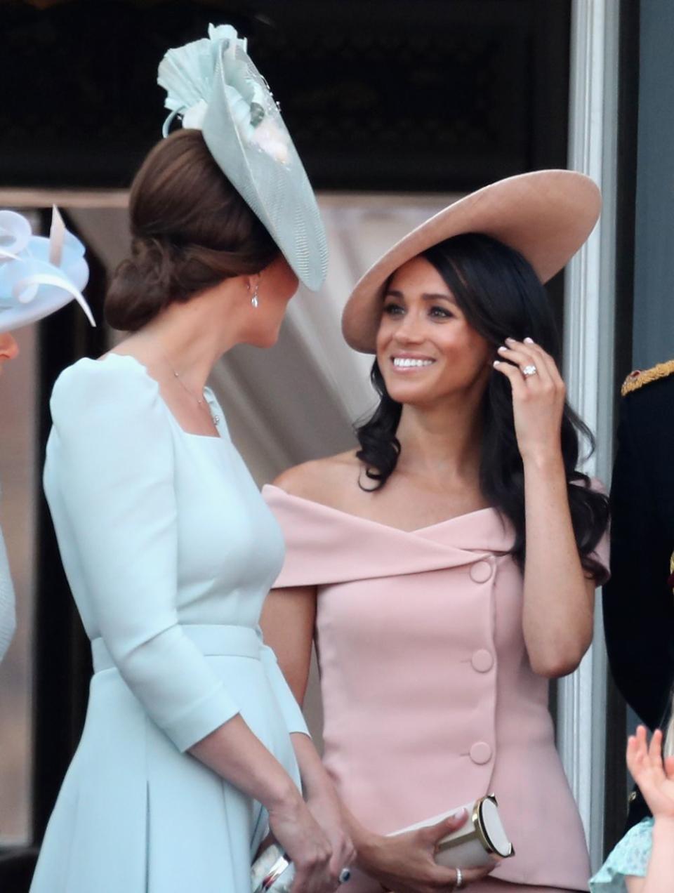 <p>Meghan attended her first ever Trooping the Colour with all the members of the royal family in June 2018. For the occasion she went for a pink buttoned <a href="https://www.cosmopolitan.com/uk/fashion/celebrity/a21244809/meghan-markle-first-trooping-the-colour-outfit/" rel="nofollow noopener" target="_blank" data-ylk="slk:Caroline Herrera dress;elm:context_link;itc:0;sec:content-canvas" class="link ">Caroline Herrera dress</a>, teamed with a Philip Treacy hat. </p>