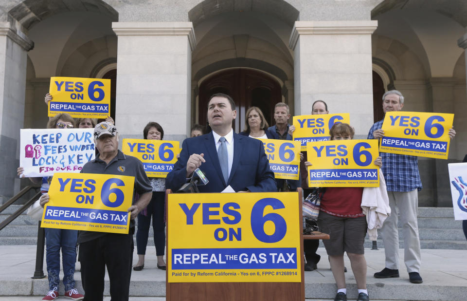 Carl DeMaio, who is leading the Proposition 6 campaign, to repeal a recent gas tax increase, discusses a ballot measure he is proposing to provide money for road repairs and eliminate high-speed rail on Tuesday, Sept. 25, 2018, in Sacramento, Calif. The 2020 initiative would change the state constitution to require that revenue from existing gas taxes be spent only for road and bridge work. (AP Photo/Rich Pedroncelli)