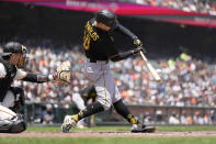 Pittsburgh Pirates' Bryan Reynolds hits a single to drive in two runs against the San Francisco Giants during the fourth inning of a baseball game in San Francisco, Wednesday, May 31, 2023. (AP Photo/Tony Avelar)