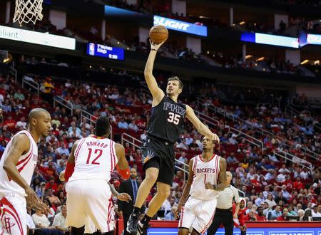 Apr 7, 2016; Houston, TX, USA; Phoenix Suns forward Mirza Teletovic (35) shoots the ball during the second quarter against the Houston Rockets at Toyota Center. Mandatory Credit: Troy Taormina-USA TODAY Sports