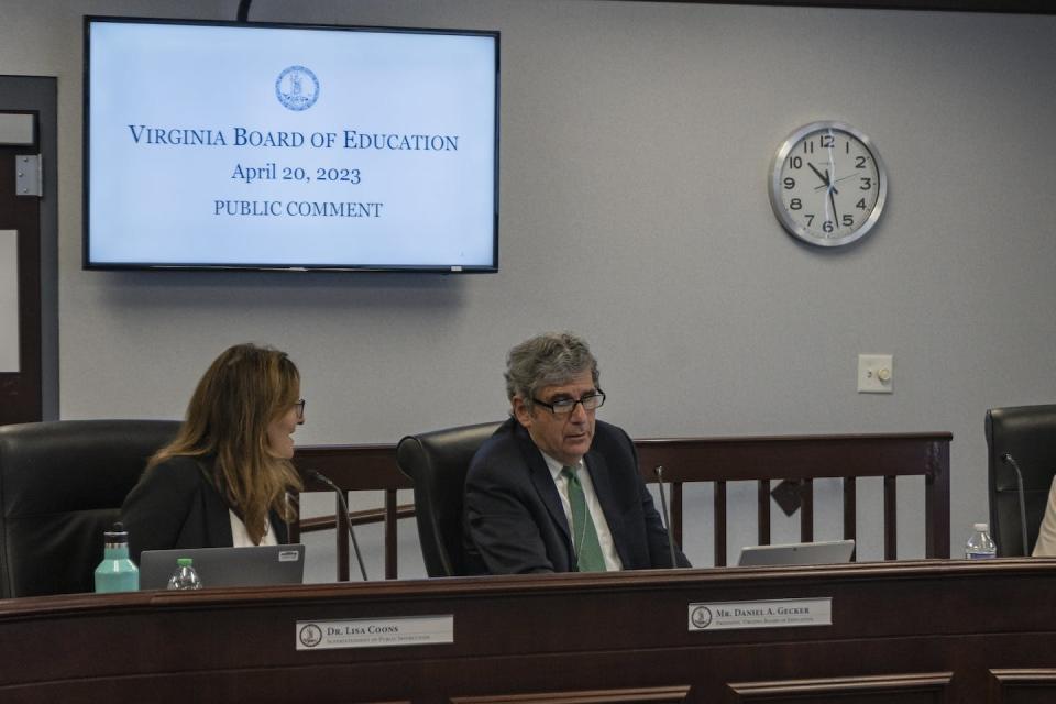 Virginia state superintendent Lisa Coons chats with state Board of Education President Daniel Gecker during a public meeting. <a href="https://www.gettyimages.com/detail/news-photo/state-superintendent-dr-lisa-coons-and-president-mr-daniel-news-photo/1252522240?adppopup=true" rel="nofollow noopener" target="_blank" data-ylk="slk:Carlos Bernate for The Washington Post via Getty Images;elm:context_link;itc:0;sec:content-canvas" class="link ">Carlos Bernate for The Washington Post via Getty Images</a>