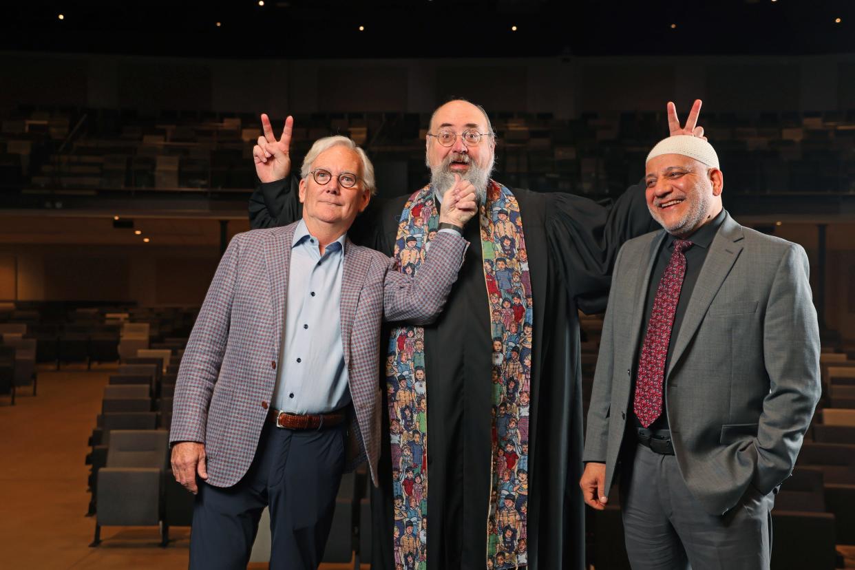 The Rev. Marty Grubbs, left, the Rev. Richard Mize, center, and Imad Enchassi have a little fun posing for a photo April 3 at Crossings Community Church in Oklahoma City.