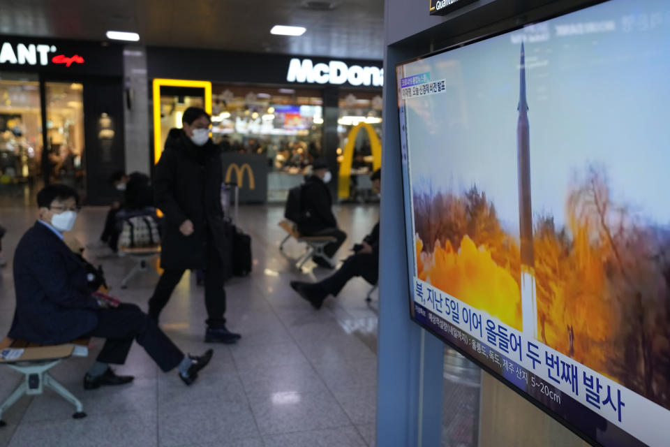 A TV shows a file image of North Korea's missile launch during a news program at the Seoul Railway Station in Seoul, South Korea, Tuesday, Jan. 11, 2022. North Korea on Tuesday fired what appeared to be a ballistic missile into its eastern sea, its second weapons launch in a week, the militaries of South Korea and Japan said. The Korean letters read "North Korea launches the second time this year." (AP Photo/Ahn Young-joon)