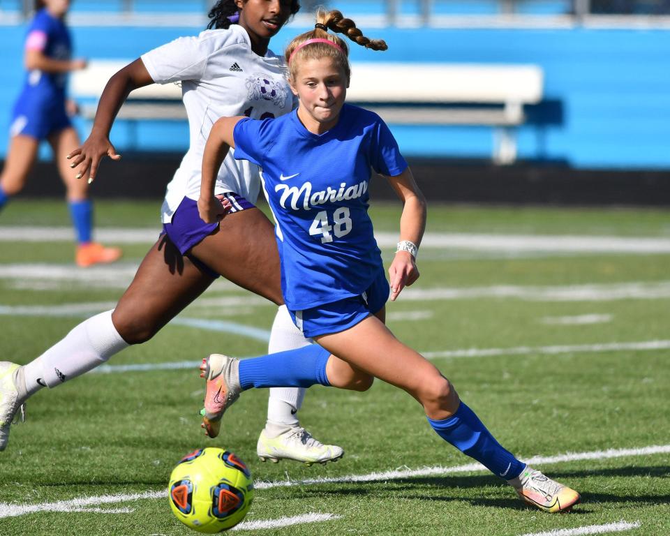 Marian’s Daisy Moody (48) in action in the second half of the class 2A semi-state match Saturday, Oct. 23, 2021, in South Bend. Marian won 1-0.