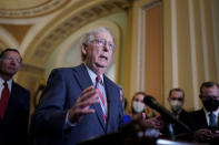 In this Sept. 14, 2021 photo, Senate Minority Leader Mitch McConnell, R-Ky., speaks to reporters at the Capitol in Washington. McConnell has warned Treasury Secretary Janet Yellen he is not budging on his demand that Democrats go it alone on the federal debt limit, deepening the emerging standoff in Congress over how to boost the government's borrowing authority. (AP Photo/J. Scott Applewhite)