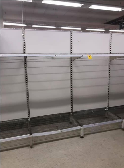 Pictured is an empty shelf in Coles in Leichhardt where toilet paper used to be. 