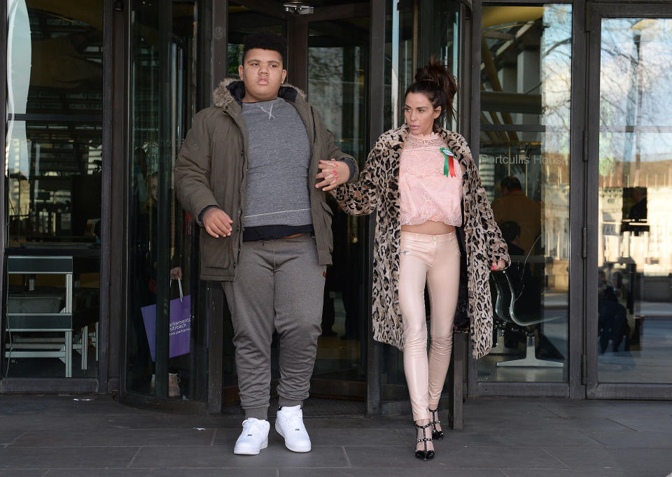 Katie Price with her son Harvey leaves Portcullis House in London after giving evidence to the Commons Petitions Committee where she called for online abuse to be made a specific offence. (Photo by Nick Ansell/PA Images via Getty Images)