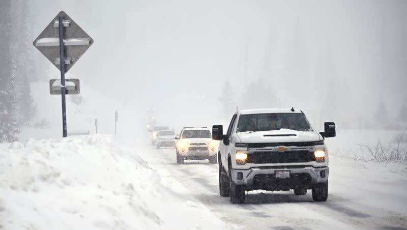Traffic moves up and down Big Cottonwood Canyon in the snow on Sunday, Jan. 14, 2024. Winter affects us in many ways, including our sleep habits.
