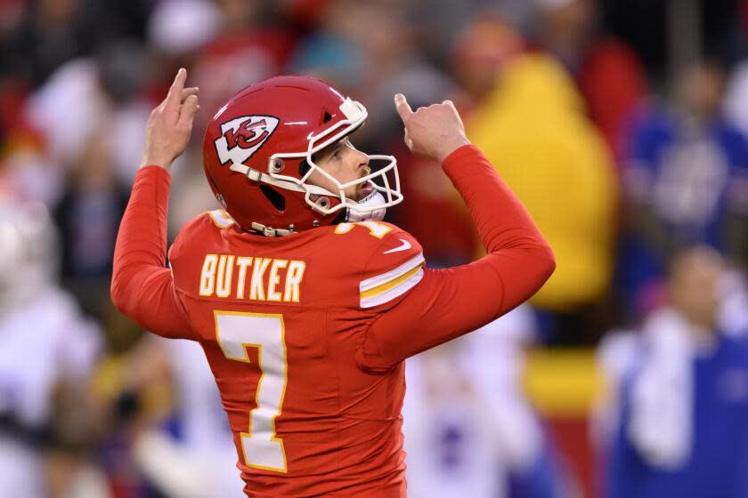 Kansas City Chiefs place kicker Harrison Butker follows through on an extra point kick