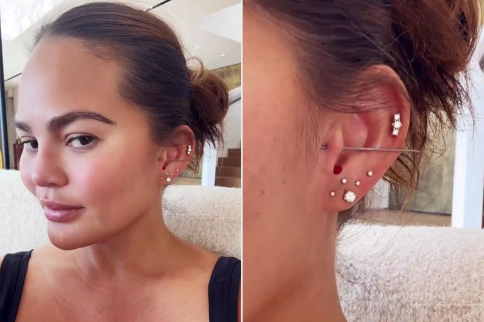 <p>Chrissy Teigen/Instagram</p> Chrissy Teigen reveals new ear piercing