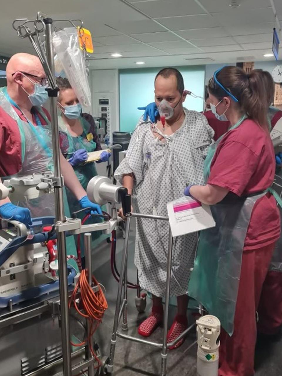 Franco with nurses during his treatment (PA)