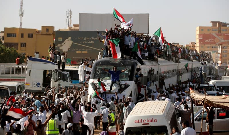 FILE PHOTO: A train carrying protesters from Atbara, the birthplace of an uprising that toppled Sudan's former President Omar al-Bashir, approaches to a train station in Khartoum