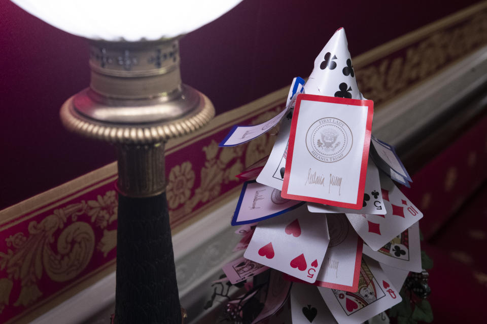 The Red Room is decorated with games, including a tree made of White House playing cards during the 2019 Christmas preview at the White House, Monday, Dec. 2, 2019, in Washington. | AP—Copyright 2019 The Associated Press. All rights reserved.