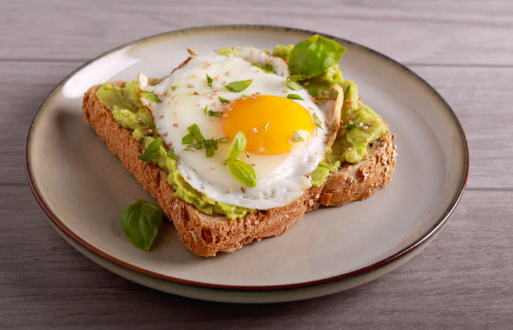 Avocado toast with a fried egg on top