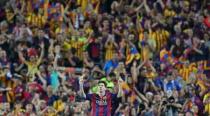 Lionel Messi celebrates after scoring the first goal for Barcelona. Reuters / Gustau Nacarino