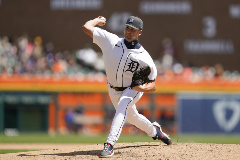 Detroit Tigers pitcher Alex Lange throws against the Texas Rangers in the fifth inning of a baseball game in Detroit, Sunday, June 19, 2022. (AP Photo/Paul Sancya)