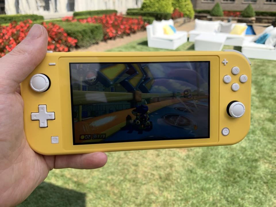 The Switch Lite is definitely more portable, but that doesn't mean you should play it in direct sunlight. (Image: Howley)