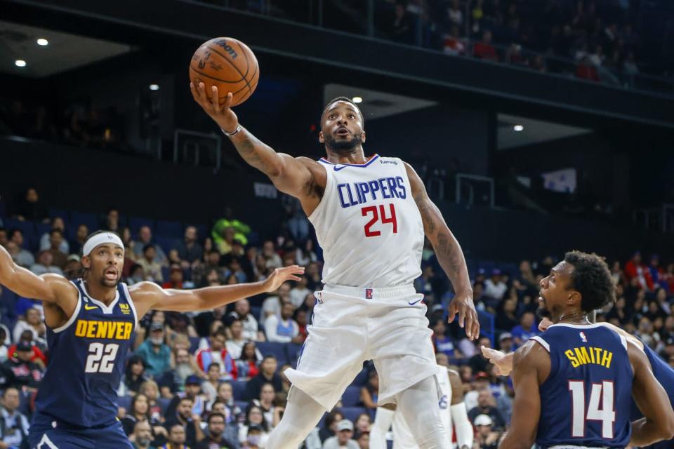 Norman Powell soars for a layup.