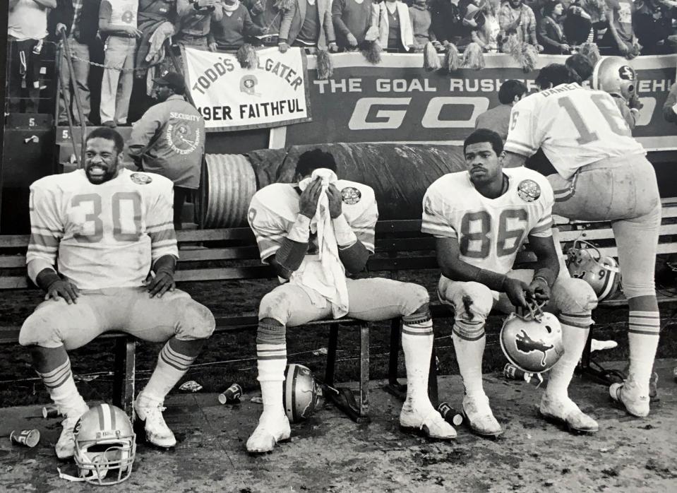 Moments after Detroit Lions kicker Eddie Murray tried but failed to kick a field goal to win the playoff game against the San Francisco 49ers in the closing seconds on Dec. 31, 1983, the offense walked off the field and reacted to losing the game. From left,  James  Jones, Leonard Thompson, Mark Nichols and Gary Danielson