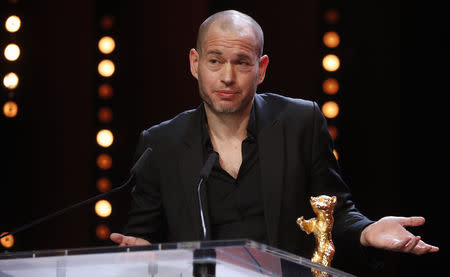 Nadav Lapid recieves Golden Bear for Best Film, during the awards ceremony at the 69th Berlinale International Film Festival in Berlin, Germany, February 16, 2019. REUTERS/Hannibal Hanschke