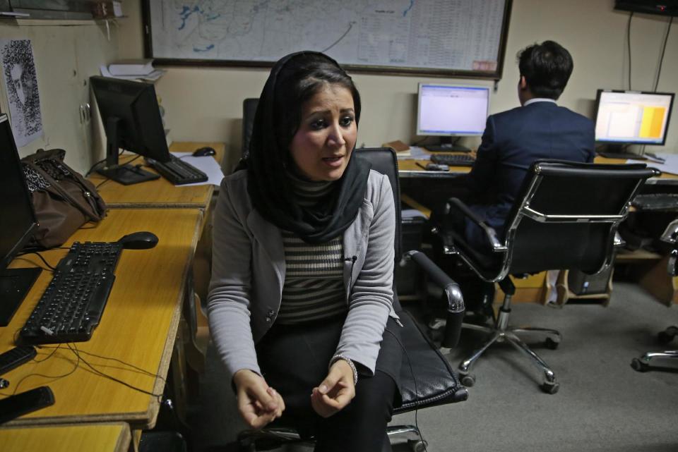 In this Monday, Feb. 3, 2014 photo, Sadaf Amiri, 23, anchor of a political talk show speaks during an interview at her office in Kabul, Afghanistan. The proliferation of Afghan media in the past 12 years is one of the most visible bright spots of the fraught project to foster a stable democracy. (AP Photo/Massoud Hossaini)