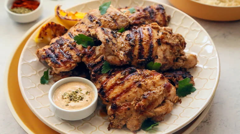 Grilled chicken on serving platter
