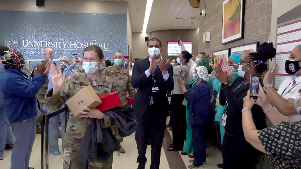 Dr. Shereef Elnahal and staff at University Hospital in Newark, saying goodbye to the U.S. Army health care workers who helped with patient load during the peak of the pandemic in May. (University Hospital Newark)