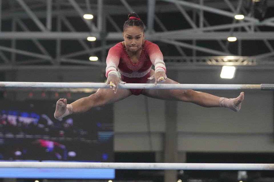 Mexico's Natalia Escalera competes on the uneven bars during the women's team artistic gymnastics final round at the Pan American Games in Santiago, Chile, Sunday, Oct. 22, 2023. (AP Photo/Martin Mejia)