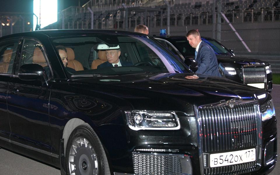 Vladimir Putin takes foreign dignitaries for a spin in his new limousine. But what do we know about the enormous vehicle? - REUTERS