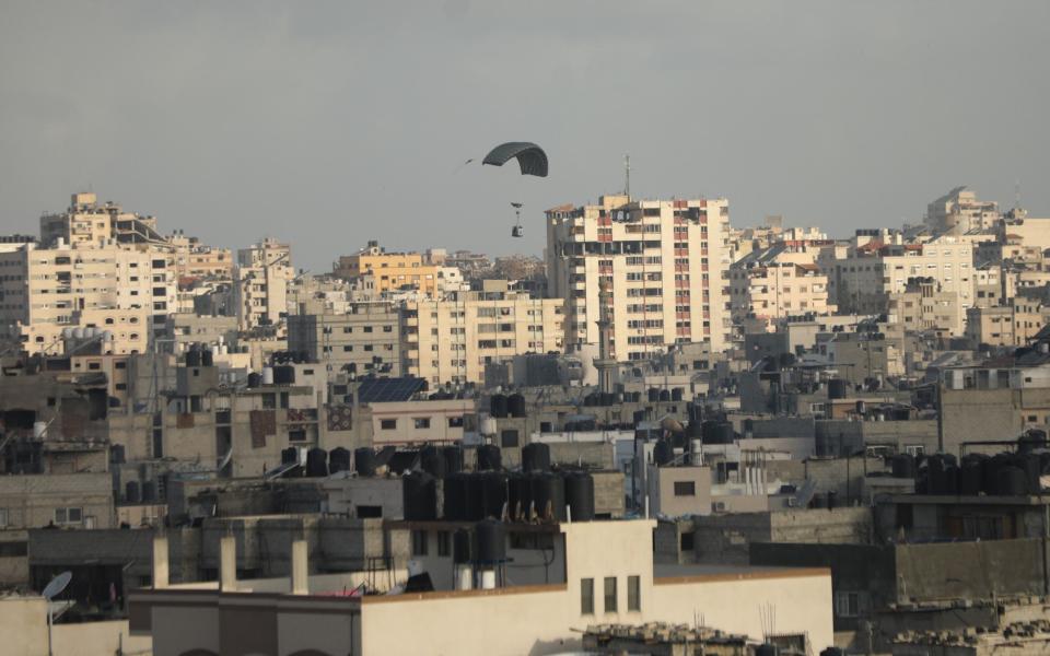 A limited amount of food aid is dropped by airplanes to the city as the Israeli attacks continue in Gaza City