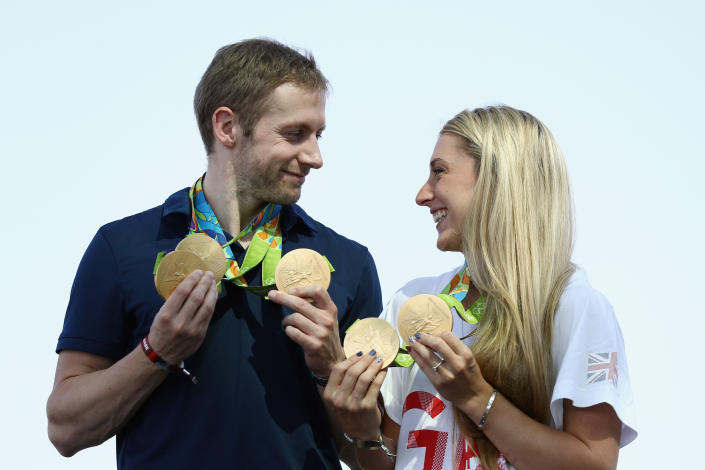 RIO DE JANEIRO, BRAZIL - AUGUST 17:  Team GB cyclists Laura Trott and Jason Kenny pose with their gold medals at Adidas House on August 17, 2016 in Rio de Janeiro, Brazil.  (Photo by Bryn Lennon/Getty Images)