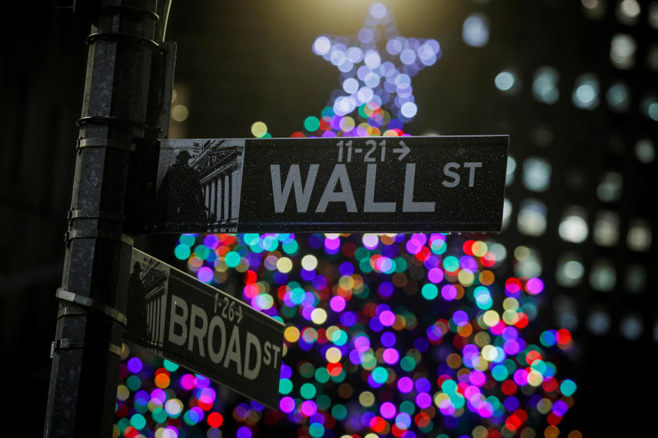 A Christmas tree is seen on Wall St. outside the New York Stock Exchange (NYSE) in New York, U.S., December 17, 2019. REUTERS/Brendan McDermid