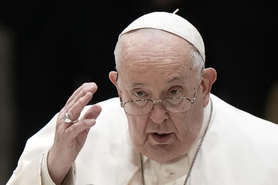 Pope Francis delivers his blessing during his weekly general audience in the Pope Paul VI hall at the Vatican, Wednesday, Dec. 20, 2023. (AP Photo/Andrew Medichini)