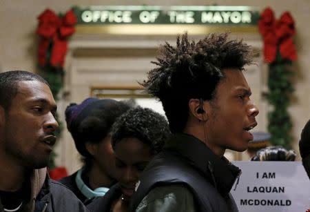 Protesters hold a demonstration outside the office of Chicago Mayor Rahm Emanuel in Chicago, Illinois, United States, December 7, 2015. T REUTERS/Jim Young