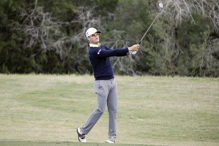 Apr 20, 2018; San Antonio, TX, USA; Zach Johnson hits from the fairway on the seventeenth hole during the second round of the Valero Texas Open golf tournament at TPC San Antonio - AT&T Oaks Course. Mandatory Credit: Soobum Im-USA TODAY Sports