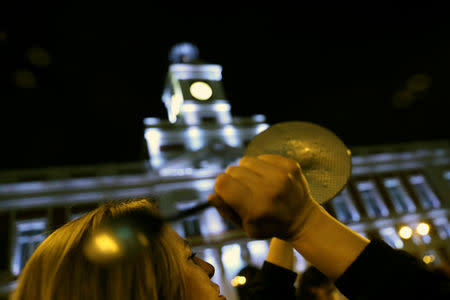 Women bang pots and pans during a protest at the start of a nationwide feminist strike on International Women's Day at Puerta del Sol Square in Madrid, Spain, March 8, 2019.REUTERS/Susana Vera