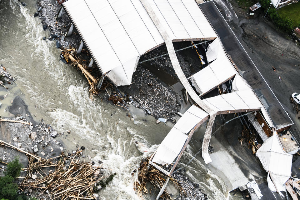 A view of the damaged ice arena taken from a helicopter in Prato Sornico, in the Maggia Valley, southern Switzerland, Sunday June 30, 2024. Authorities say weekend storms in Switzerland and northern Italy caused extensive flooding and landslides, leaving at least four people dead. Storms and heavy rain affected southern and western Switzerland on Saturday and overnight. (Samuel Golay/Ti-Press/Keystone via AP)