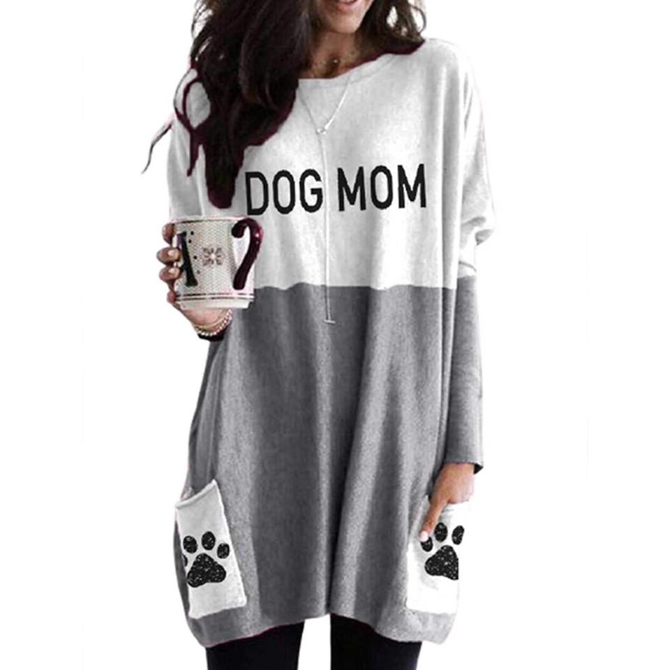 Model wearing a Dog Mom T-Shirt Dress on a white background