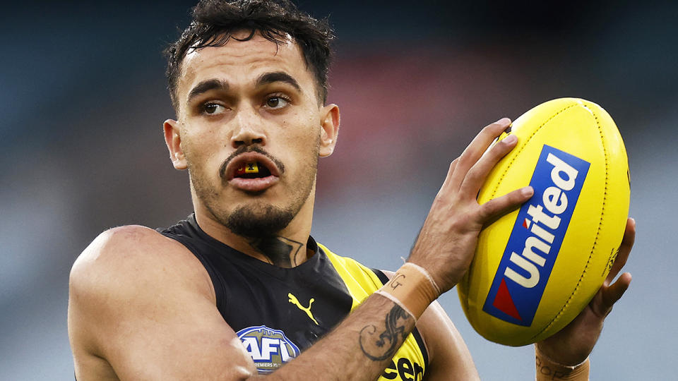 Richmond's Sydney Stack copped a serve from Kane Cornes over a video of him jumping off a cliff in the Mornington Peninsula was posted online. (Photo by Daniel Pockett/AFL Photos/via Getty Images)