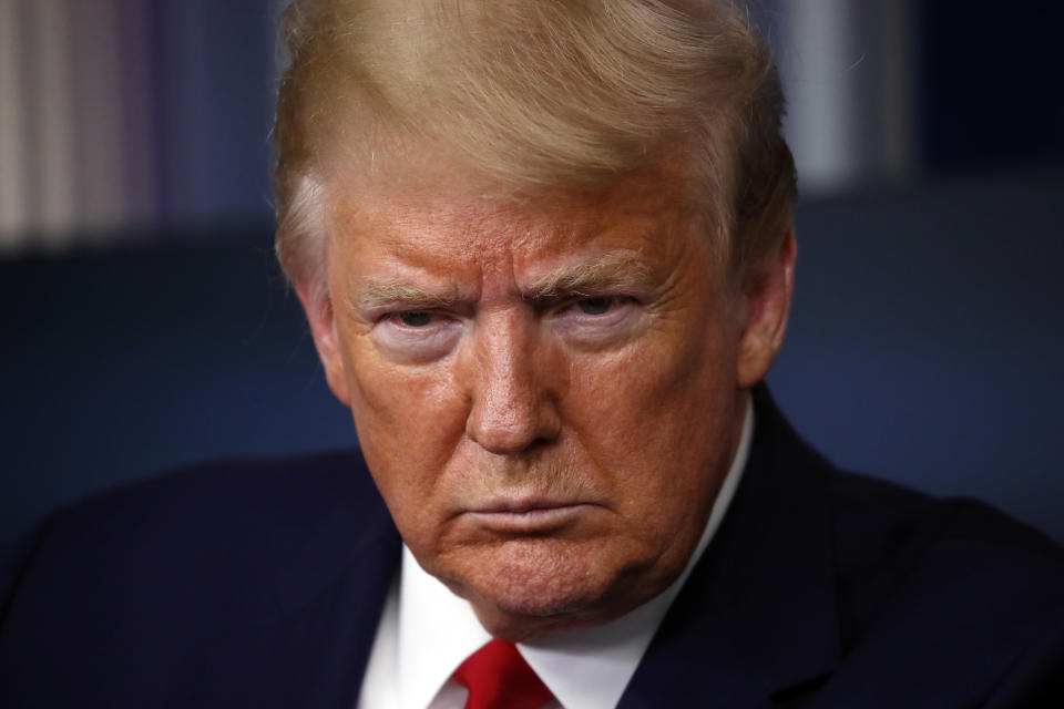 President Donald Trump listens to a question from a reporter as he speaks about the coronavirus in the James Brady Press Briefing Room of the White House, Monday, April 6, 2020, in Washington. (AP Photo/Alex Brandon)