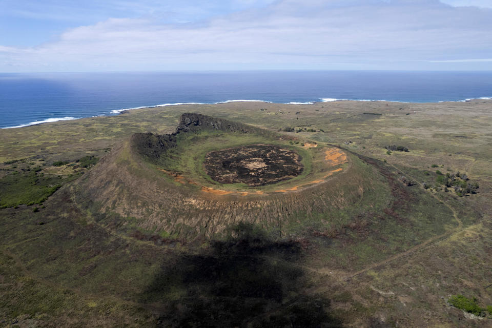 The Rano Raraku volcano, one of the archaeological sites affected by a fire, is pictured in the Rapa Nui park, Easter Island, Chile, Nov. 15, 2022. / Credit: PABLO SANHUEZA/REUTERS