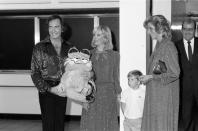 <p>While meeting Princess Diana ahead of his concert in 1984, Neil Diamond wore a sequin button-down shirt and black pants. He gifted the pregnant Princess with a toy Garfield. </p>