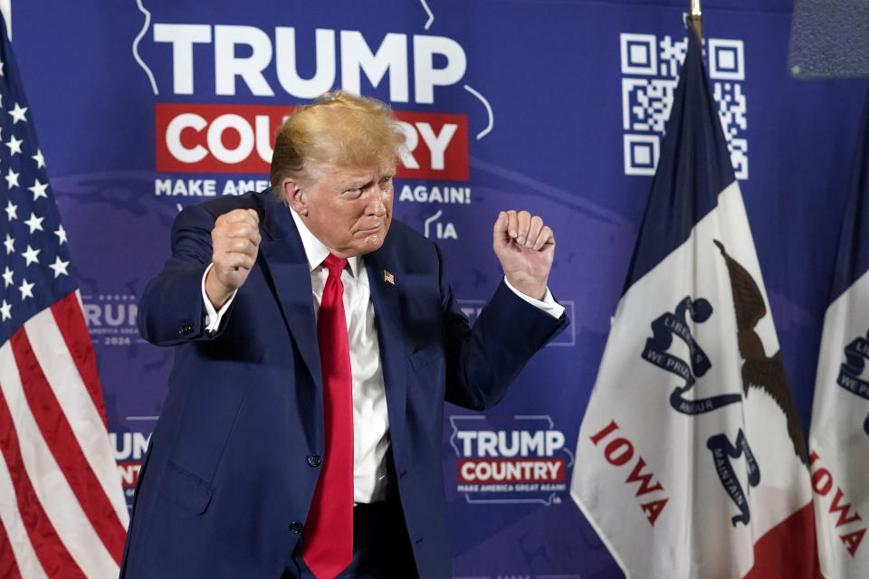 Former President Donald Trump dances after speaking at a campaign rally at Terrace View Event Center in Sioux Center, Iowa, Friday, Jan. 5, 2024. (AP Photo/Andrew Harnik)