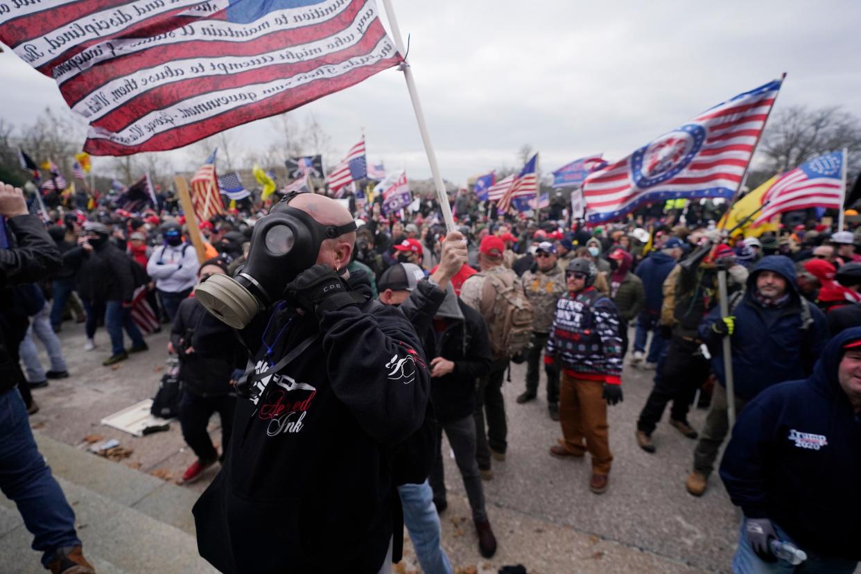 Trump supporters gather outside the Capitol on Wednesday, Jan. 6, 2021, in Washington. As Congress prepares to affirm President-elect Joe Biden's victory, thousands of people have gathered to show their support for President Donald Trump and his claims of election fraud.