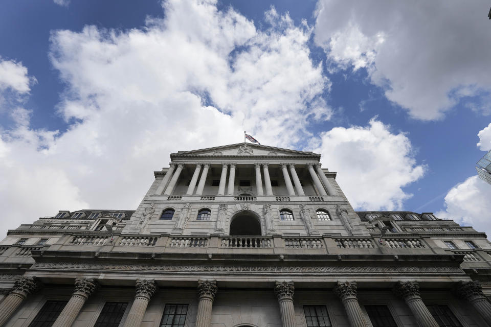 FILE - View at the Bank of England, at the financial district in London, Thursday, May 11, 2023. The Bank of England is set to join its peers in the U.S. and Europe in keeping borrowing rates unchanged at its policy meeting Thursday, Dec. 14 despite mounting worries over the state of the British economy. (AP Photo/Frank Augstein, File)