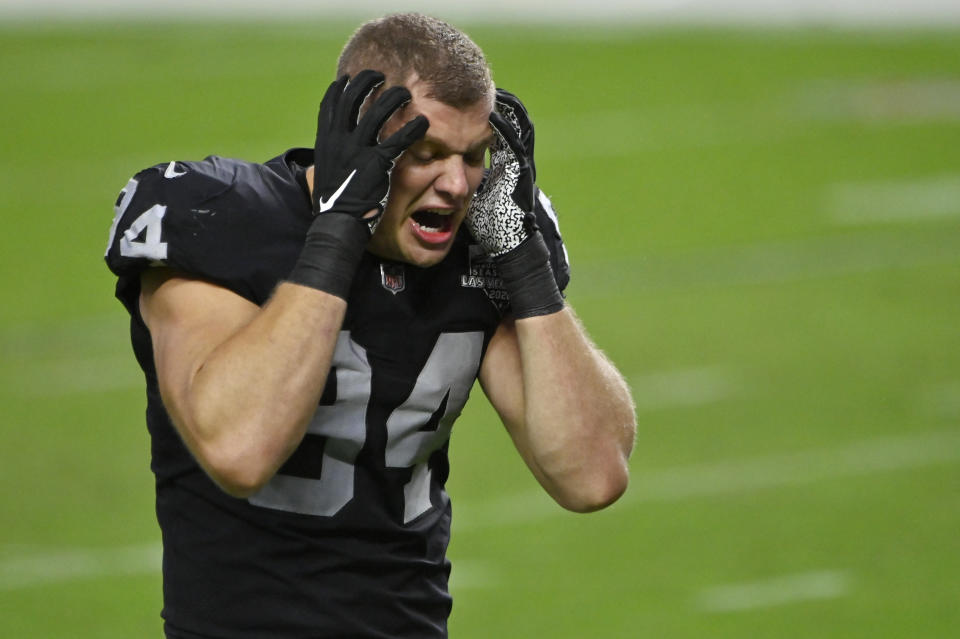 Las Vegas Raiders defensive end Carl Nassib (94) reacts after the Las Vegas Raiders lost to the Tampa Bay Buccaneers in an NFL football game, Sunday, Oct. 25, 2020, in Las Vegas. (AP Photo/David Becker)