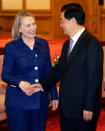 BEIJING, CHINA - MAY 4: China's President Hu Jintao (R) shakes hands with U.S. Secretary of State Hillary Clinton during a meeting at the Great Hall of the People on May 4, 2012 in Bejing, China. Gary Locke, Secretary Clinton, Treasury Secretary Timothy F. Geithner attended a fourth joint meeting of the U.S.-China Strategic and Economic Dialogue with Chinese officials. (Photo by Jason Lee-Pool/Getty Images)
