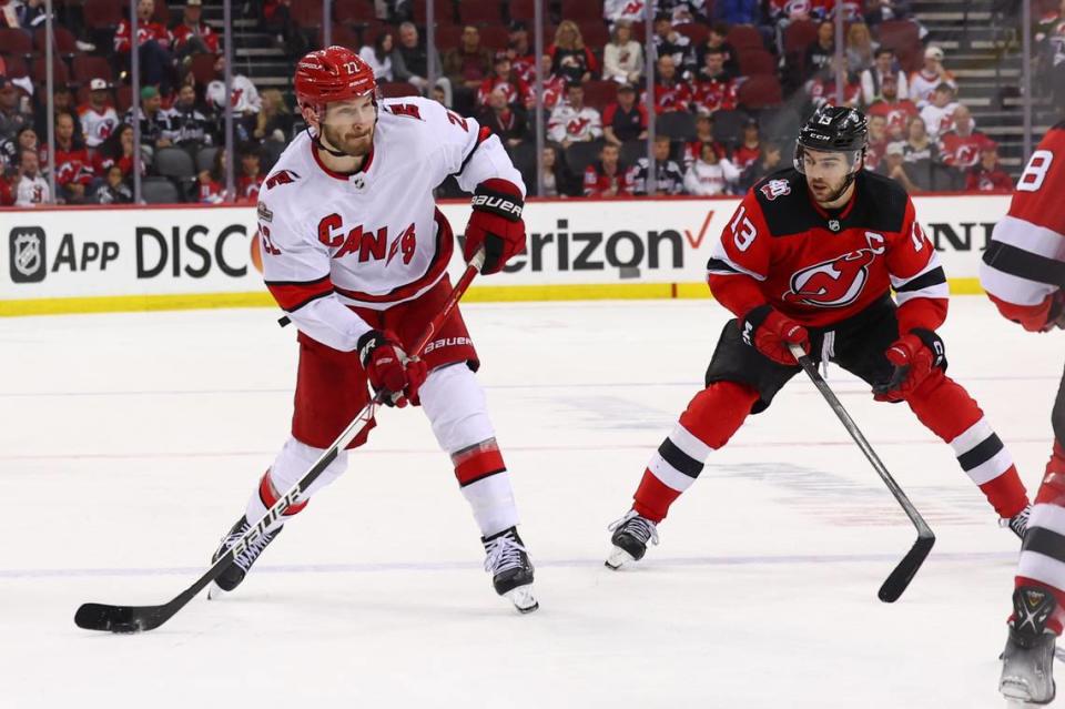 Carolina Hurricanes defenseman Brett Pesce (22) shoots the puck against the New Jersey Devils during the third period in game four of the second round of the 2023 Stanley Cup Playoffs at Prudential Center.